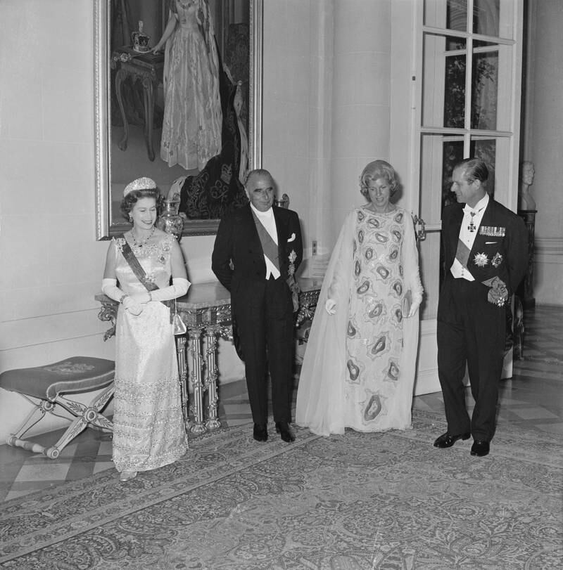 Queen Elizabeth and Prince Philip pictured with former French president Georges Pompidou and his wife Claude Pompidou at the British Embassy in Paris in May 1972. Getty Images