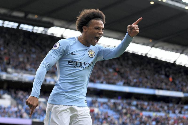 Manchester City's German midfielder Leroy Sane celebrates after scoring their fourth goal during the English Premier League football match between Manchester City and Liverpool at the Etihad Stadium in Manchester, north west England, on September 9, 2017. / AFP PHOTO / Oli SCARFF / RESTRICTED TO EDITORIAL USE. No use with unauthorized audio, video, data, fixture lists, club/league logos or 'live' services. Online in-match use limited to 75 images, no video emulation. No use in betting, games or single club/league/player publications.  / 