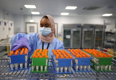 A lab technician works at the Amazon Covid-19 testing lab in Worsley, Britain. Reuters
