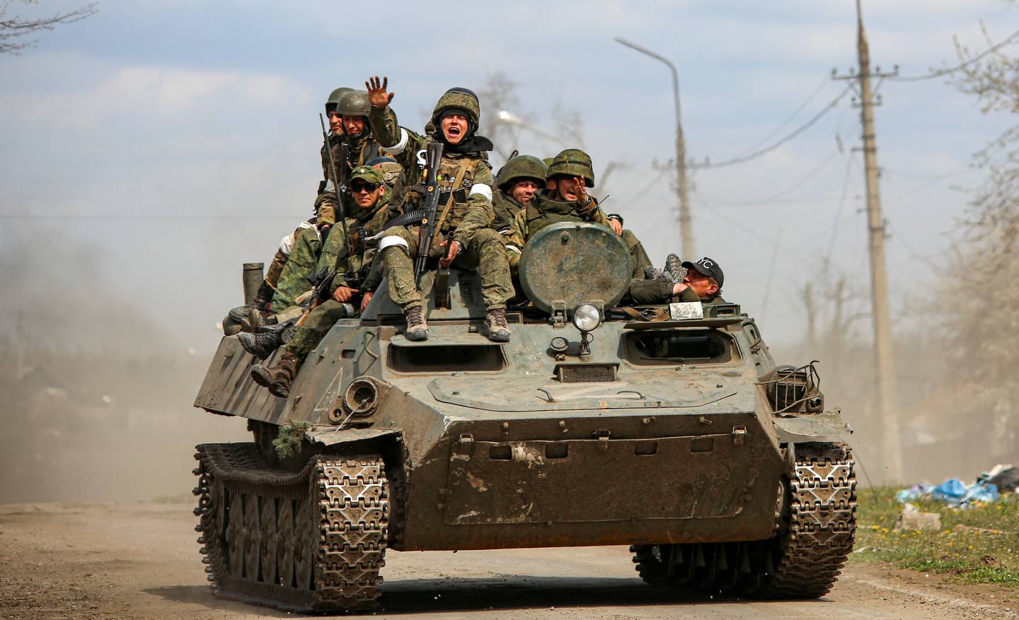 Pro-Russian troops on an armoured vehicle in the southern port city of Mariupol, Ukraine April 21, 2022.  Reuters