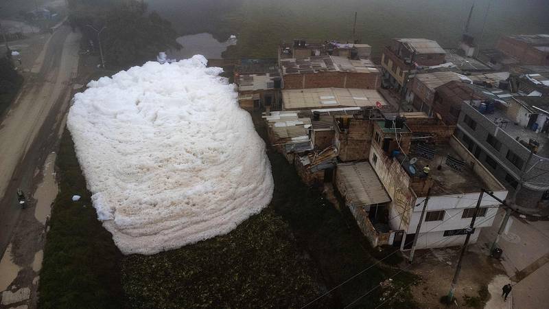 Pungent foam that formed in the polluted Mosquera River and ended up in the Los Puentes neighbourhood, west of Bogota. AFP