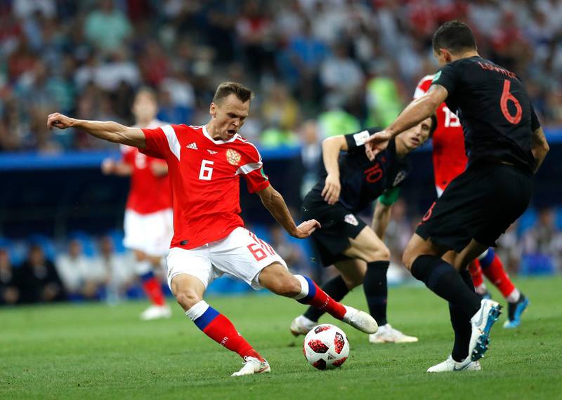 Russia's Denis Cheryshev scores his side's opening goal during the quarterfinal match between Russia and Croatia at the 2018 soccer World Cup in the Fisht Stadium, in Sochi, Russia, Saturday, July 7, 2018. (AP Photo/Pavel Golovkin)