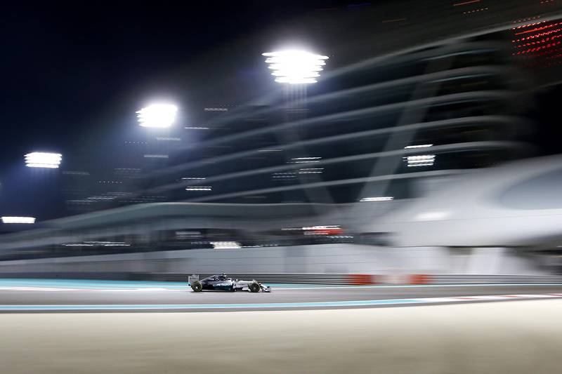Abu Dhabi, United Arab Emirates, November 23, 2014:     Mercedes driver Lewis Hamilton races to victory and the championship during the Formula One Etihad Airways Grand Prix at the Yas Marina Circuit in Abu Dhabi on November 23, 2014. Christopher Pike / The NationalReporter:  N/ASection: SportKeywords: 
