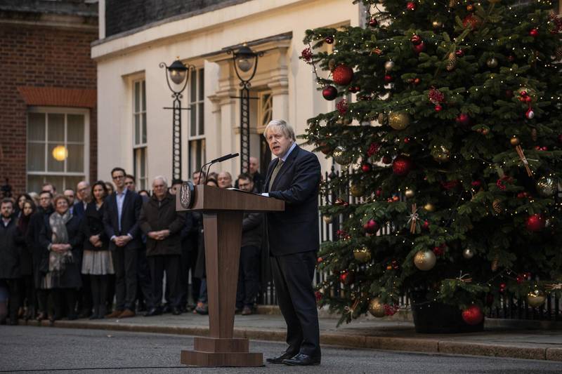 LONDON, ENGLAND - DECEMBER 13: Prime Minister Boris Johnson makes a statement in Downing Street after receiving permission to form the next government during an audience with Queen Elizabeth II at Buckingham Palace earlier today, on December 13, 2019 in London, England. The Conservative Party have realised a decisive win in the UK General Election. With one seat left to declare they have won 364 of the 650 seats available. Prime Minister Boris Johnson called the first UK winter election for nearly a century in an attempt to gain a working majority to break the parliamentary deadlock over Brexit. working majority to break the parliamentary deadlock over Brexit. He said at an early morning press conference that he would repay the trust of voters. (Photo by Dan Kitwood/Getty Images)