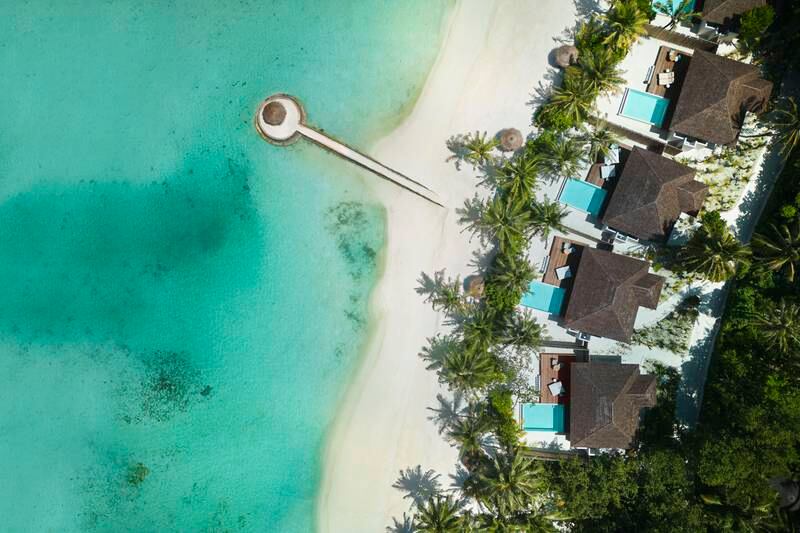 Beach pool villas offer direct access to the island's pristine shoreline