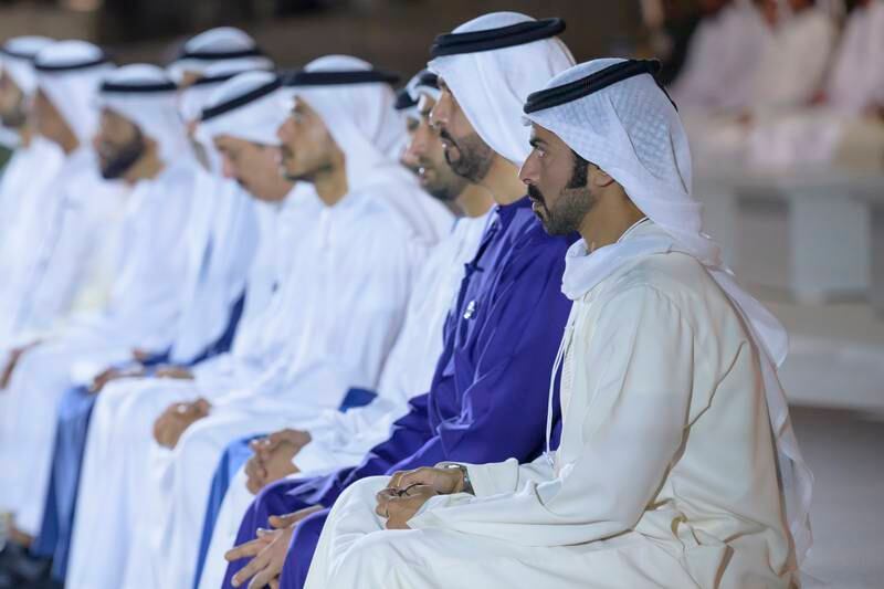 Sheikh Khalifa bin Tahnoun, Executive Director of the Martyrs' Families' Affairs Office, right, and Sheikh Khalifa bin Mohammed bin Khalid, UAE Ambassador to Jordan, second right, attend the Commemoration Day ceremony at Wahat Al Karama.