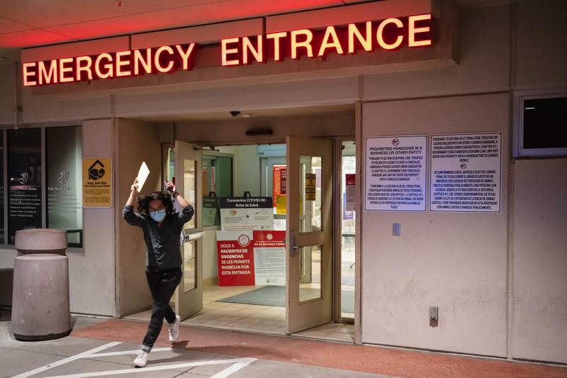 Adri Perez, with Common Cause 866ourvote, on his way to return to polling place with an emergency ballot from a person hospitalized with Covid-19 at Las Palmas Medical Centre in El Paso, Texas on November 3, 2020. AFP