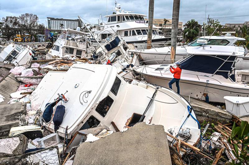 Boats wrecked by Hurricane Ian in Fort Myers, Florida. AFP