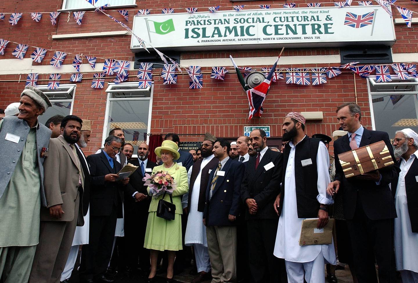 Queen Elizabeth II with members of the Muslim community in Scunthorpe in 2002. PA Wire