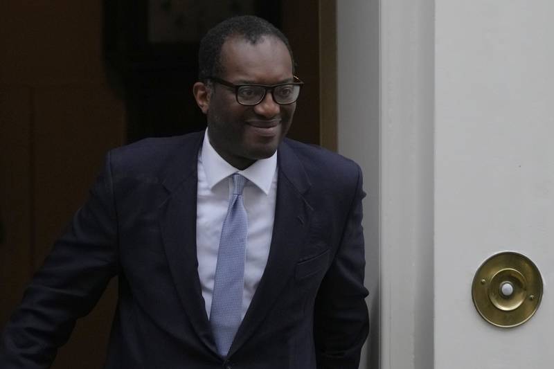 Britain's former Chancellor of the Exchequer Kwasi Kwarteng leaves 11, Downing Street. He has been sacked after weeks of economic chaos during his brief term in office. AP