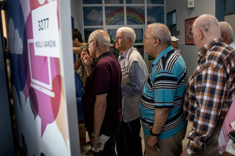 ISTANBUL, TURKEY - JUNE 24:  People line up to cast their votes in the countries parliamentary and presidential election on June 24, 2018 in Istanbul, Turkey. Voting opened across Turkey after weeks of campaigning. Turks are voting in a snap Parliamentary and Presidential election called by President Recep Tayyip Erdogan.  (Photo by Chris McGrath/Getty Images)