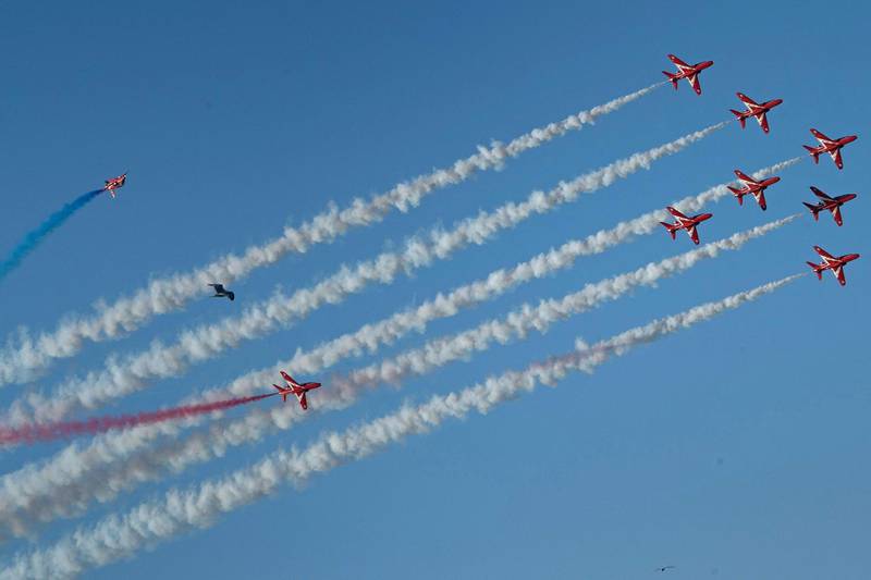 The Red Arrows fly over Carbis Bay and St Ives during the G7 summit. AFP