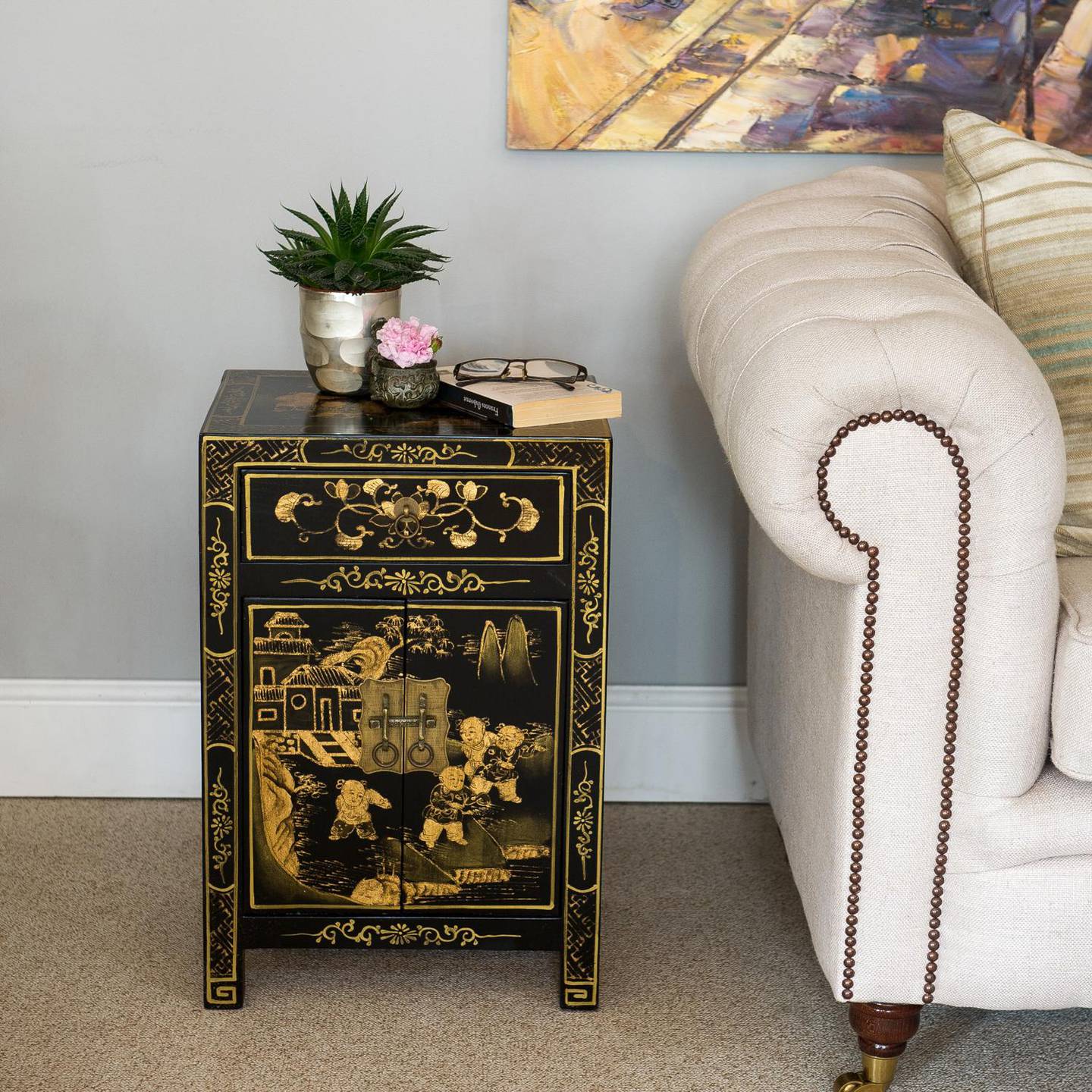 Add interest to a stark look with a touch of the East, such as this Chinoiserie side cabinet. Photo: Orchid Furniture 