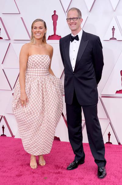 Dana Leigh Murray, in Christopher John Rogers, and Pete Docter arrive for the 93rd annual Academy Awards ceremony at Union Station in Los Angeles, California, on, 25 April 25, 2021. EPA