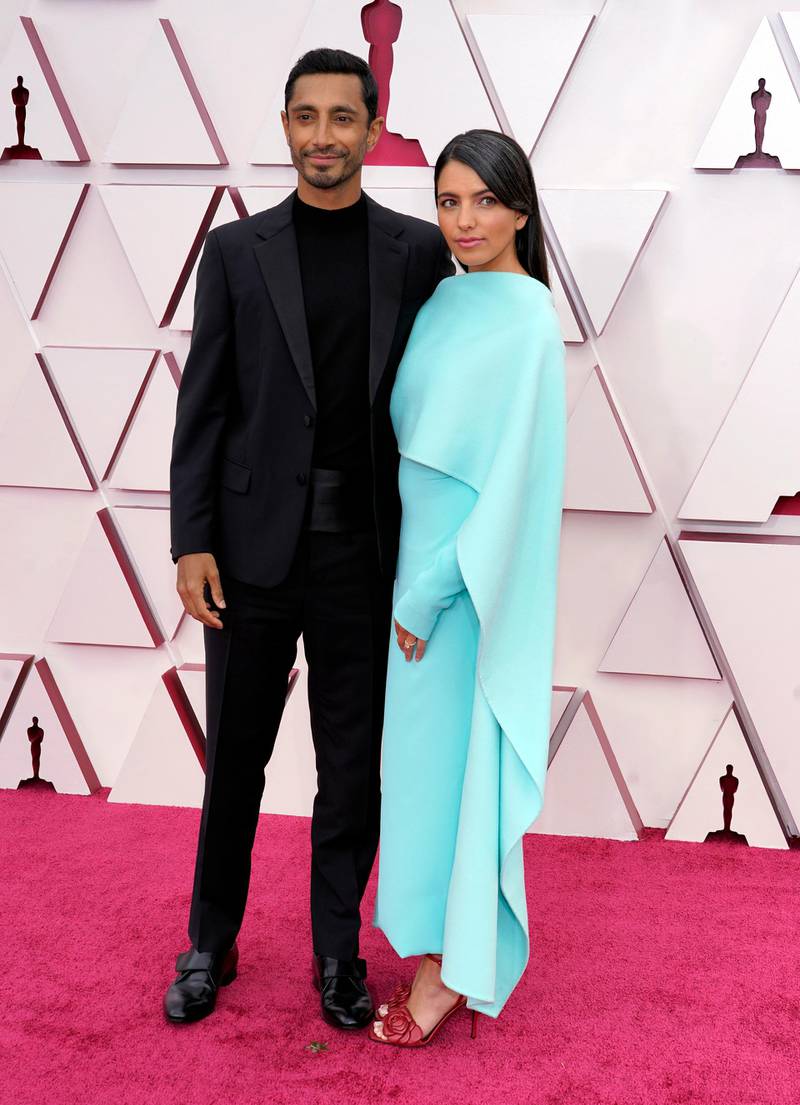 Riz Ahmed and Fatima Farheen Mirza, in Valentino, arrive for the 93rd annual Academy Awards ceremony at Union Station in Los Angeles, California, on, 25 April 25, 2021. EPA