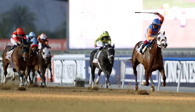 Jockey Antonio Fresu on Zenden from the USA (R)  win the Dubai Golden Shaheen race at the Dubai World Cup in Dubai.  EPA
