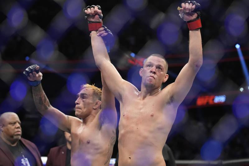 Nate Diaz, right, celebrates after defeating Tony Ferguson in a welterweight bout during the UFC 279 mixed martial arts event Saturday, Sept.  10, 2022, in Las Vegas.  (AP Photo / John Locher)