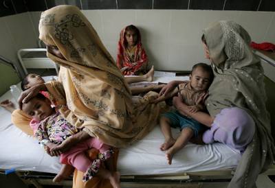 Sick Pakistani children at the District Headquarters Hospital in the flood-affected Muzaffargarh district, in Punjab province. AP