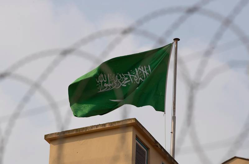 epa07111115 A Saudi flag is seen at the top of Saudi Consulate in Istanbul, Turkey, 22 October 2018. Saudi Arabian official media on 19 October reported that journalists Jamal Khashoggi died as a result of a physical altercation inside the kingdom's consulate in Istanbul, where he was last seen entering on 02 October for routine paperwork. The Turkish government said it would publish findings from its own investigation into the disappearance and alleged murder of Khashoggi.  EPA/TOLGA BOZOGLU