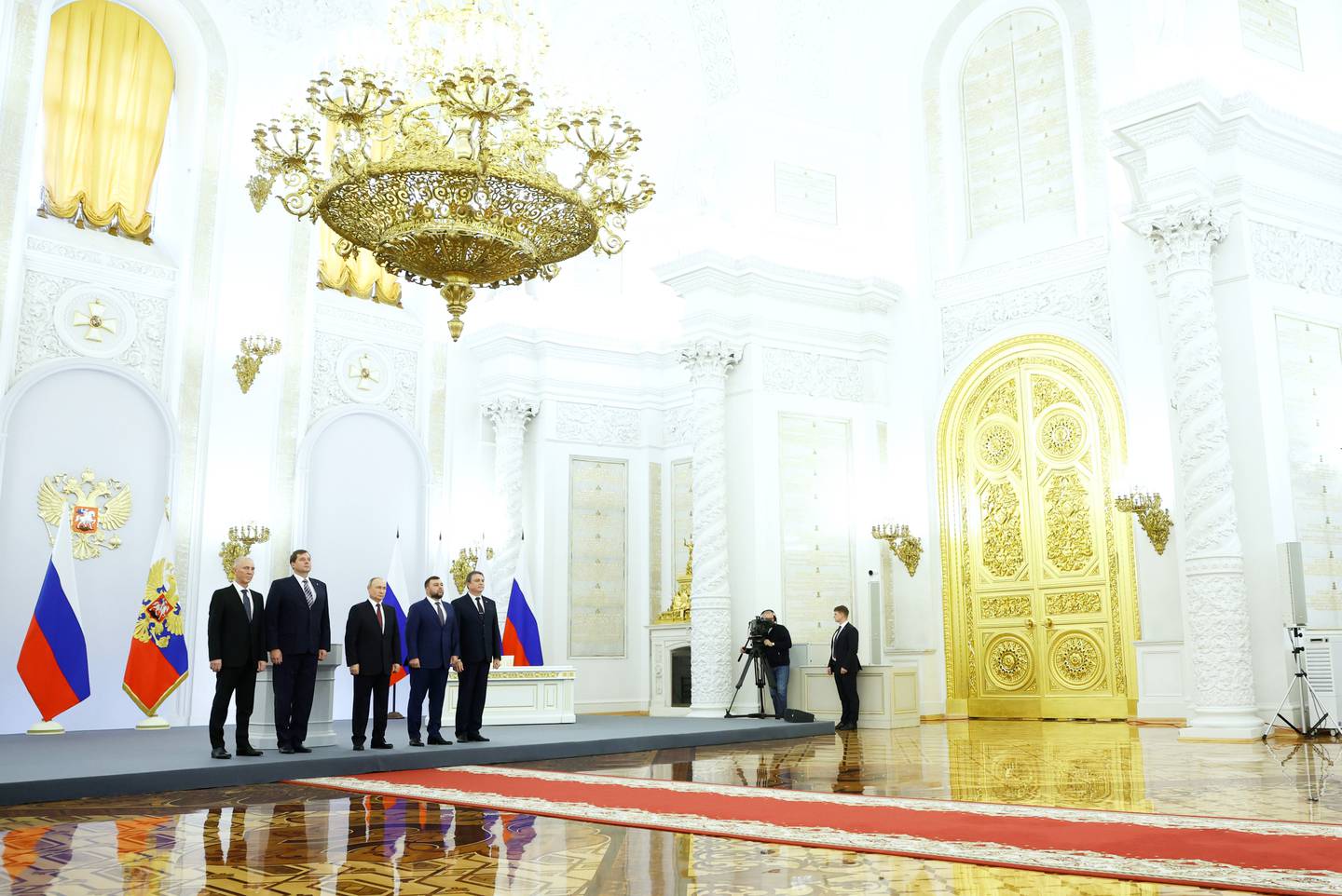 Russia's President Vladimir Putin gave a speech in an opulent Kremlin hall before signing the acts of accession. EPA 
