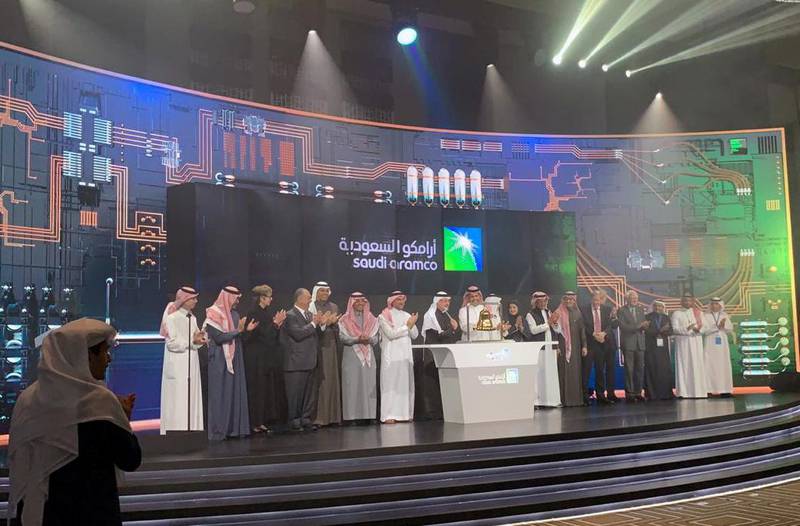 Participants attend the official ceremony marking the debut of Saudi Aramco's initial public offering (IPO) on the Riyadh's stock market, in Riyadh, Saudi Arabia. Reuters