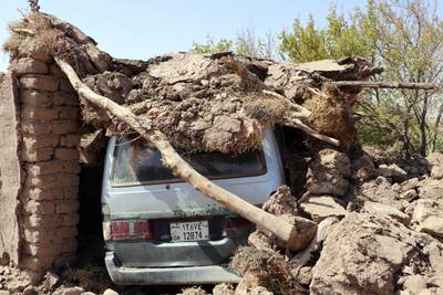 A damaged car after an earthquake in the Zenda Jan district in Herat province. AP