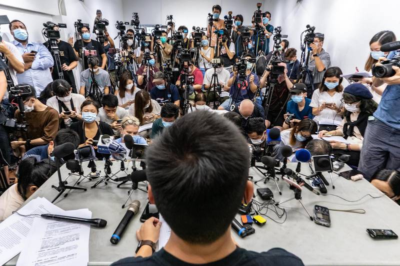 Pro-democracy activist Joshua Wong speaks during a press conference after being disqualified for his Legislative Council nominations in Hong Kong, China. Getty Images