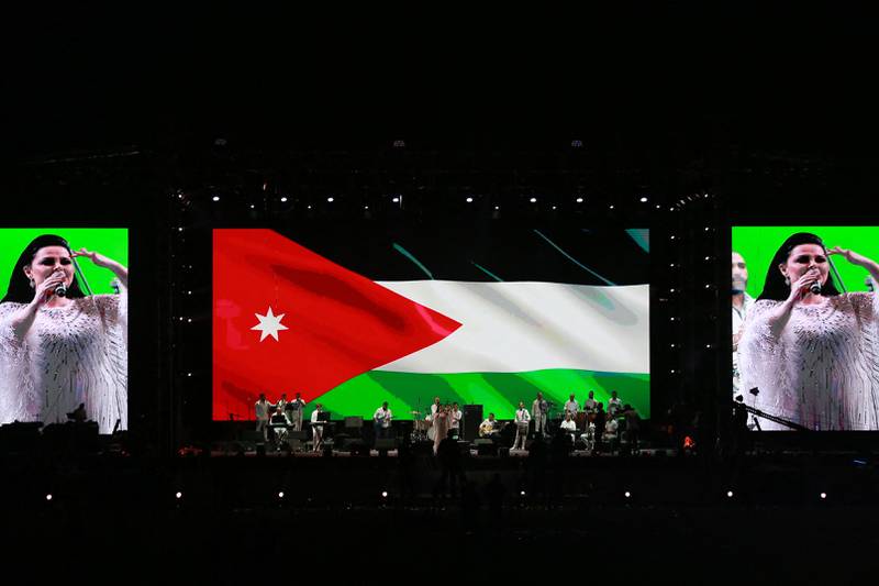 Jordanian singer Diana Karazon performs during the concert celebration at Amman International Stadium. AFP