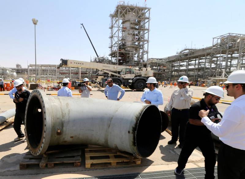 A damaged pipeline is seen at Saudi Aramco oil facility in Khurais. Reuters