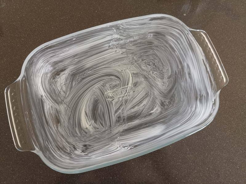 Step five: grease whatever loaf tin or baking dish you have available at home