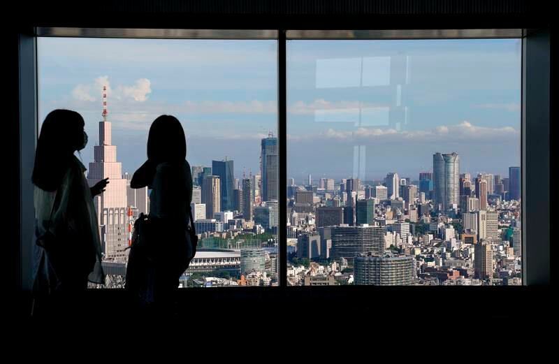 Sightseers on the 54th-floor viewing deck of the Tokyo Metropolitan Government Building. Japan has lifted more coronavirus restrictions to allow more foreign tourists in. EPA