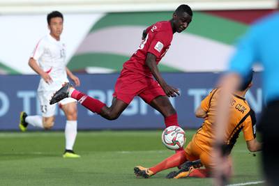 Almoez Ali scores to give Qatar a 4-0 lead over North Korea. EPA