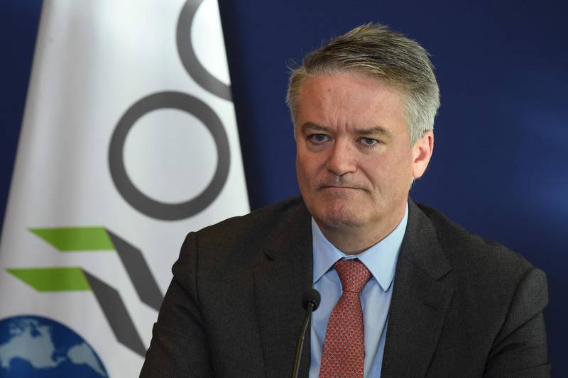 OECD head Mathias Cormann said leaders must address imbalances such as unequal vaccine coverage to keep the global recovery from Covid-19 'strong and on track'. AFP