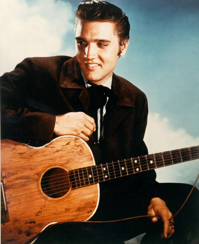 MALIBU, CA - AUGUST 1956: Rock and roll singer Elvis Presley during the filming of "Love Me Tender" in Los Angeles, CA. (Photo by Michael Ochs Archives/Getty Images)