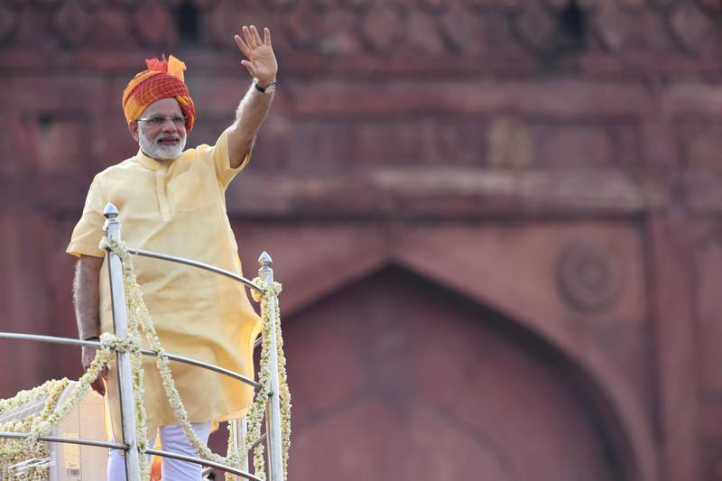 Indian Prime Minister Narendra Modi waves following his address during the country's 71st Independence Day celebrations, which marks the 70th anniversary of the end of British colonial rule, at the historic Red Fort in New Delhi on August 15, 2017. 
India can defend itself from anyone who seeks "to act against our country", Prime Minister Narendra Modi said in an Independence Day speech August 15 amid a tense standoff with Beijing over a Himalayan plateau.
 / AFP PHOTO / PRAKASH SINGH