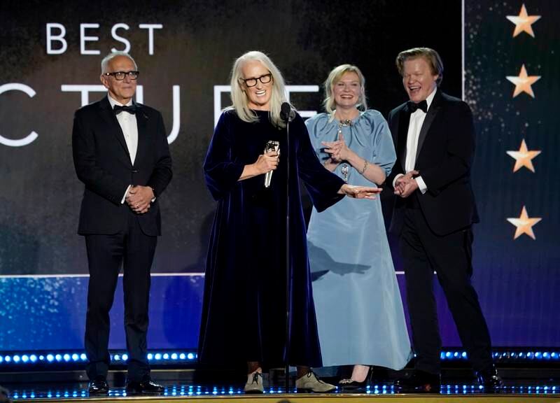 From left, Roger Frappier, Jane Campion, Kristen Dunst and Jesse Plemons accept the award for Best Picture for 'The Power of the Dog'. AP