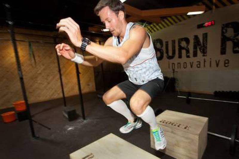 UAE - Dubai - Mar 19 - 2012:  Lee Ryan training at The Burn Room gym, Intercoil building. Ryan is aiming to break a world record during the virgin london marathon ''Fastest marathon wearing a 10kg/20lb pack", on 22nd april 2012. He is also  fundraising for prostate cancer for this challenges because he lost a friend a few years ago because of the disease. ( Jaime Puebla / The National Newspaper )