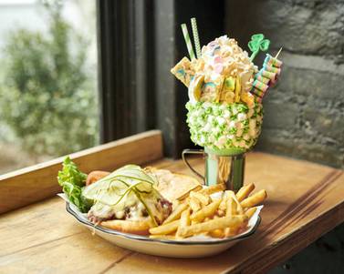 Black Tap serves up a classic Reuben burger and a Lucky Charms CrazyShake at locations in both Abu Dhabi and Dubai. Courtesy Black Tap 