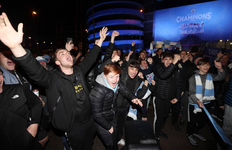 Soccer Football - Premier League - Manchester City fans celebrate winning the Premier League. Reuters