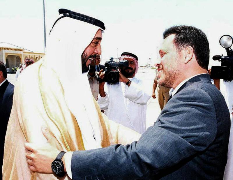 Sheikh Khalifa, left, greets Jordan's King Abdullah in Abu Dhabi on May 16, 2000. Wam
