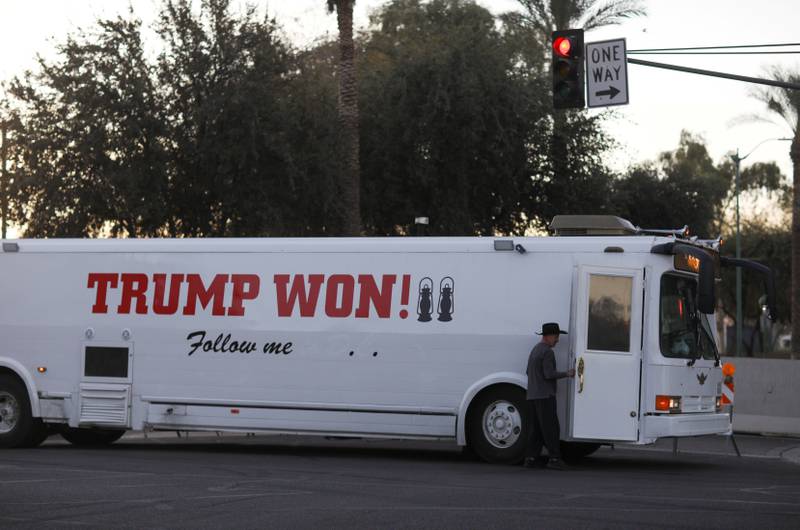 A Donald Trump supporter arrives ahead of a protest against the election of President Joe Biden in Phoenix, Arizona. Reuters / Caitlin O'Hara / File Photo