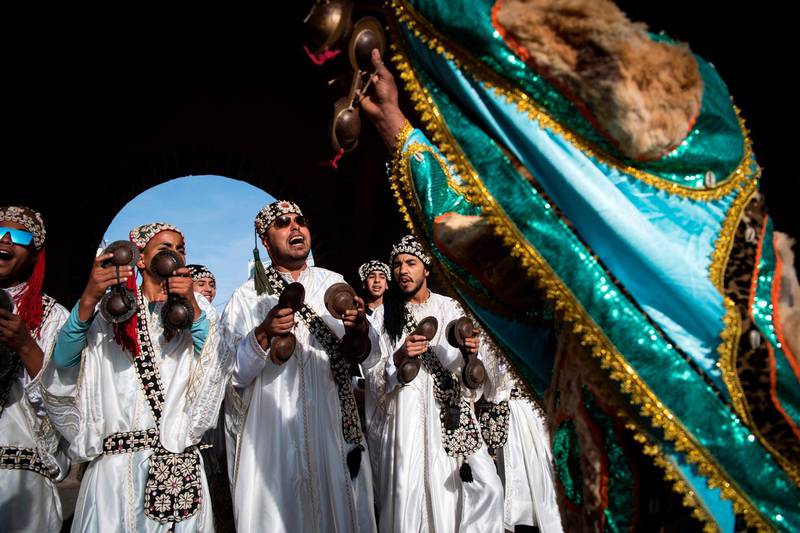 A Gnawa traditional group performs in the city of Essaouira to celebrate the decision to add the Gnawa culture to Unesco's list of Intangible Cultural Heritage of Humanity.  AFP