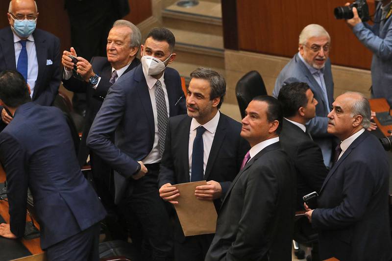 Lebanese MP Michel Moawad (holding the brown envelope) said Thursday's session "was an important step to unify the opposition, the majority of which elected me". AFP