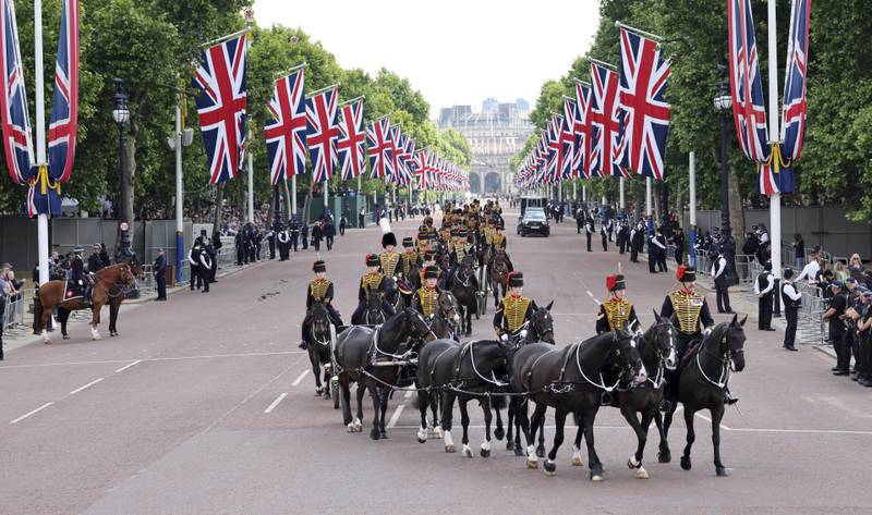 The Kings Troop of the Royal Horse Artillery ride down The Mall on their way to fire the ceremonial gun. AP