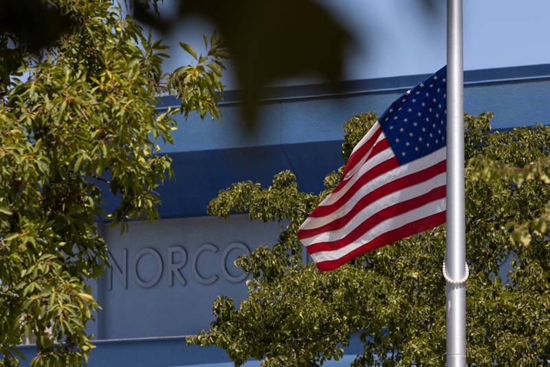 The American flag flies at half-mast outside Norco High School, Norco, California, where Marine Corps Lance Cpl Kareem Nikoui, who was killed in the Kabul airport attack, graduated in 2019.  Reuters