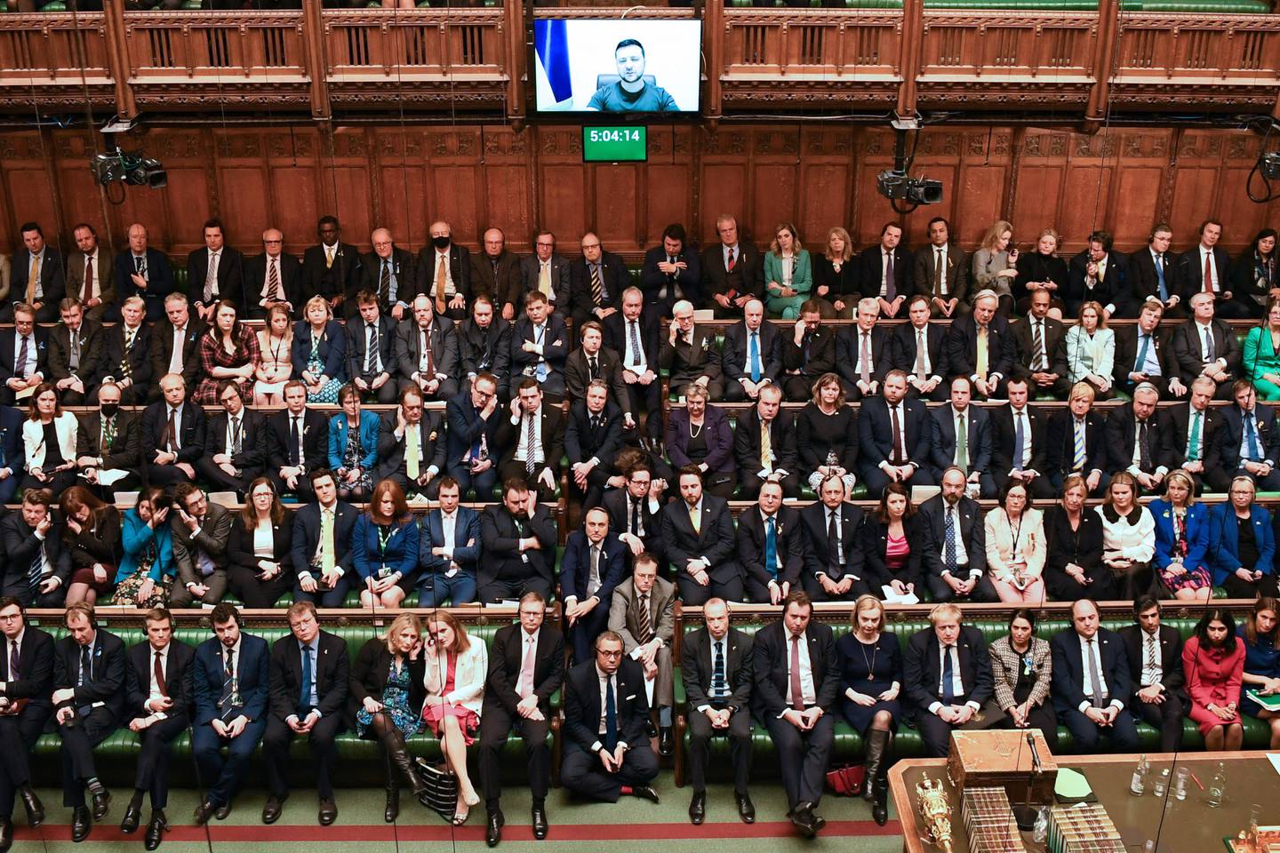 MPs listen to President Volodymyr Zelenskyy speaking to them by video link in March last year. AFP