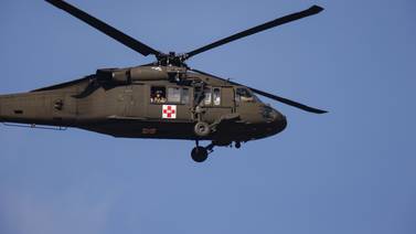 The Blackhawk helicopter can carry up to 12 soldiers and usually four crew members. AFP