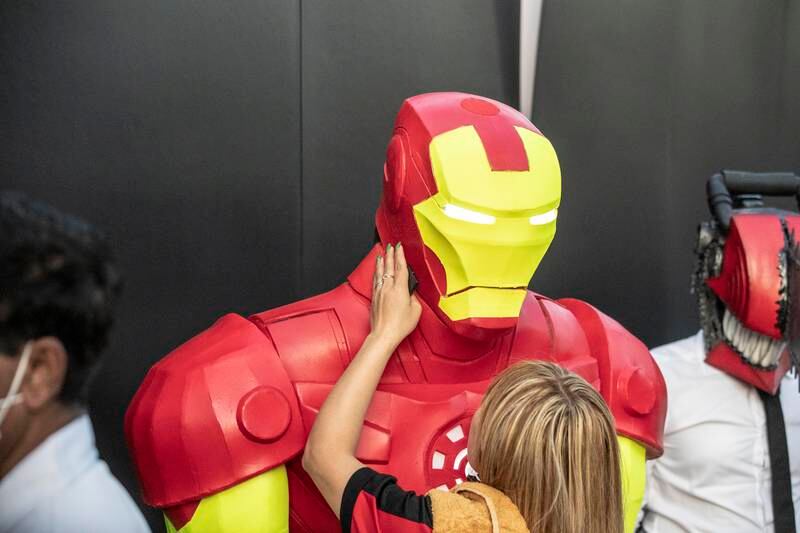 A cosplayer as the Marvel superhero Iron Man.
