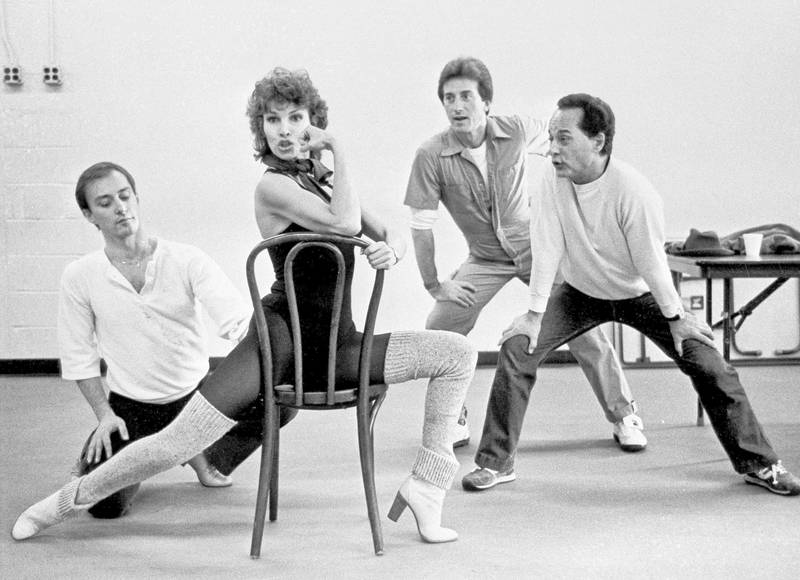 Raquel Welch at a rehearsal for the Broadway show Woman of the Year, with, from left, Ed Nolfi, Sterling Clark and Paul Bogave in New York, in November 1981.  AP
