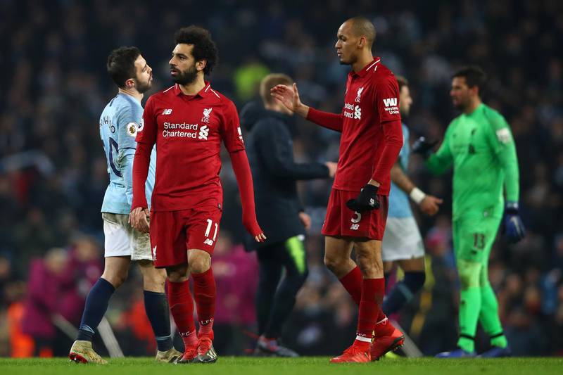 Bernardo Silva of Manchester City reacts as Fabinho of Liverpool attempts to shake hands with him after the Premier League match. Getty Images